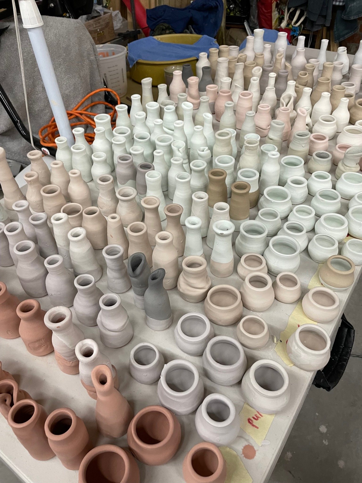 Finished glazed bottles arranged together